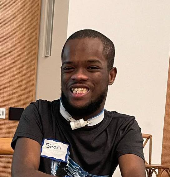 Sean Gold, non-speaking public speaker, smiling